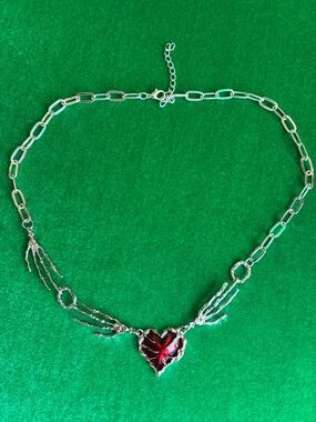 NEW Gothic skeleton hands holding a metallic red heart necklace dark romantic